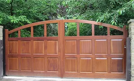 arch topped wooden driveway gate